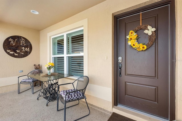 2188 Gordon Path, The Villages, FL 32163 - doorway to property with outdoor dining area and a patio