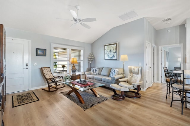 2188 Gordon Path, The Villages, FL 32163 - living area featuring a ceiling fan, visible vents, baseboards, lofted ceiling, and light wood-style flooring