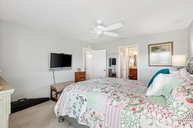 2188 Gordon Path, The Villages, FL 32163 - carpeted bedroom featuring ensuite bath and ceiling fan