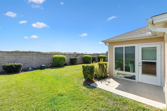 2188 Gordon Path, The Villages, FL 32163 - view of yard featuring a fenced backyard and a patio area