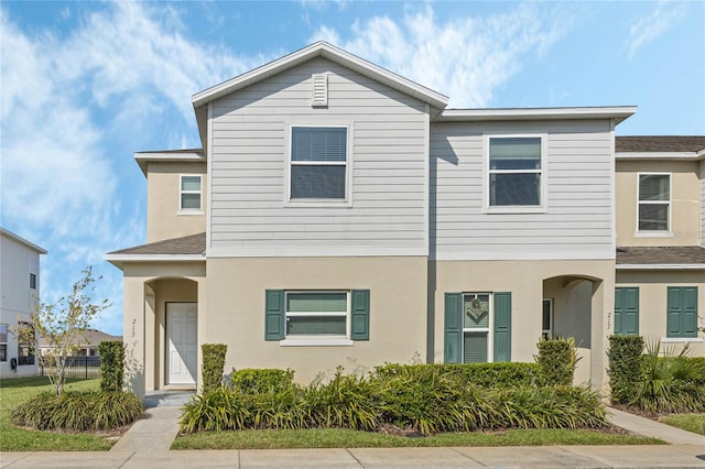 multi unit property featuring stucco siding