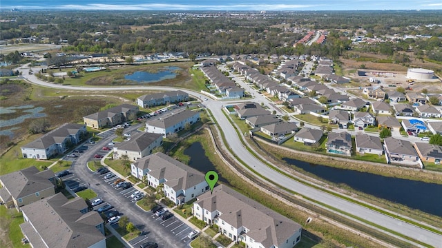 aerial view featuring a residential view and a water view