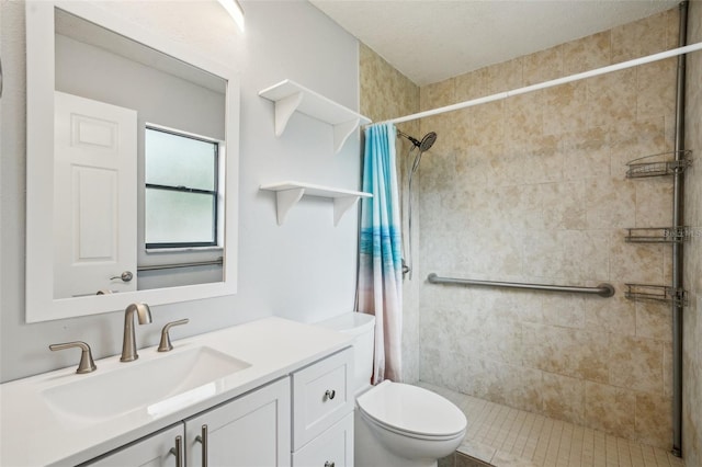 full bath featuring a shower stall, toilet, and vanity