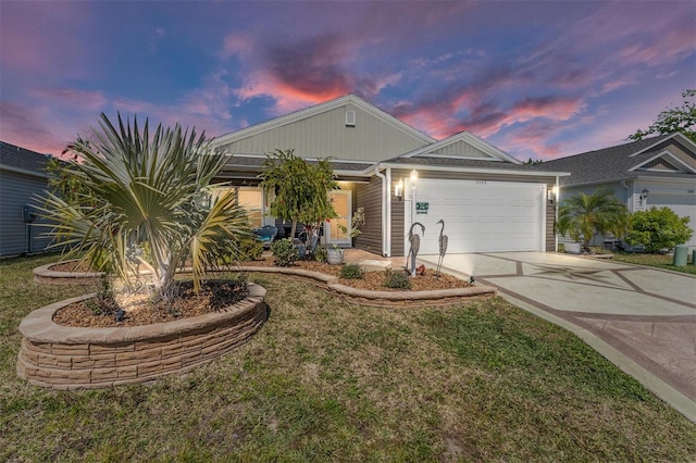 3786 Stephanie Way, The Villages, FL 32163 - view of front of property with a front yard, an attached garage, and driveway