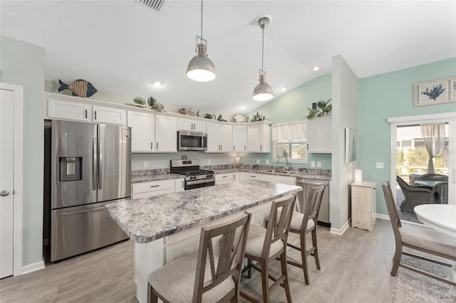 3786 Stephanie Way, The Villages, FL 32163 - kitchen featuring plenty of natural light, white cabinets, stainless steel appliances, and a sink