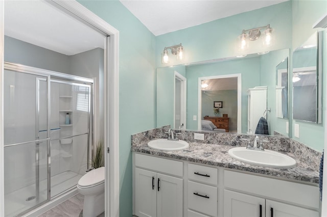 3786 Stephanie Way, The Villages, FL 32163 - full bathroom with a sink, double vanity, ensuite bath, and a shower stall
