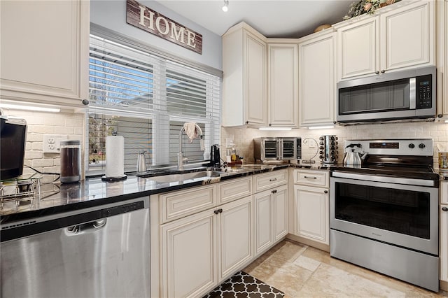 8880 SE 161st St, Summerfield, FL 34491 - kitchen with a sink, dark stone countertops, backsplash, appliances with stainless steel finishes, and a toaster
