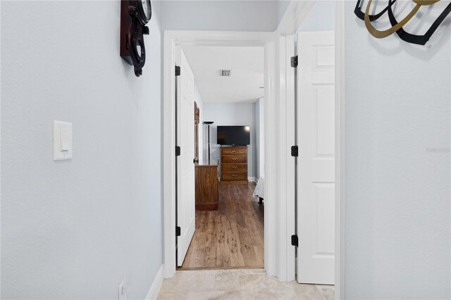 8880 SE 161st St, Summerfield, FL 34491 - hallway with visible vents and baseboards