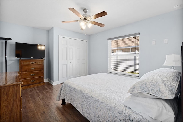 8880 SE 161st St, Summerfield, FL 34491 - bedroom with baseboards, wood finished floors, a closet, and ceiling fan