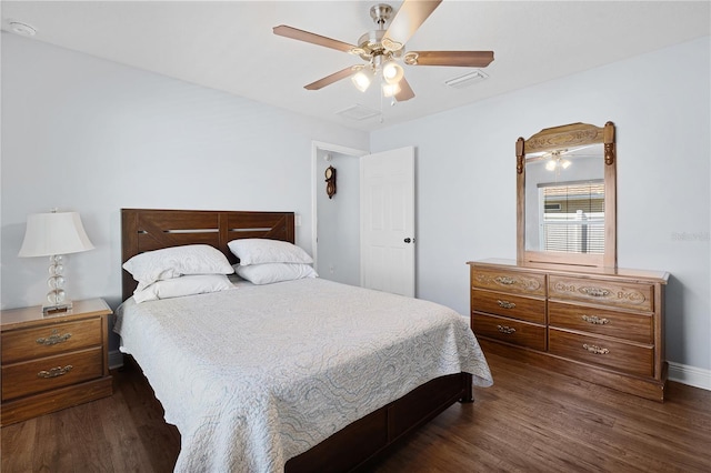 8880 SE 161st St, Summerfield, FL 34491 - bedroom with dark wood-style floors, visible vents, and ceiling fan
