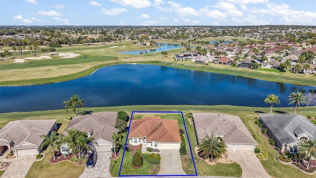 birds eye view of property featuring a residential view and a water view