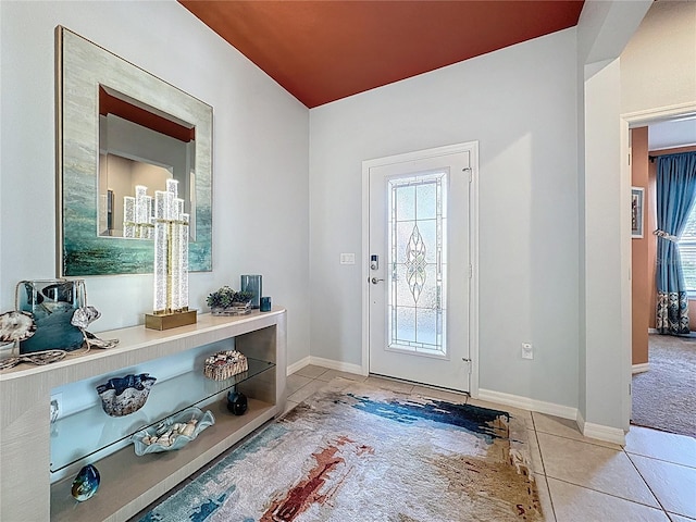 entryway featuring tile patterned floors and baseboards