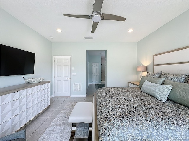 bedroom with tile patterned flooring, recessed lighting, and visible vents