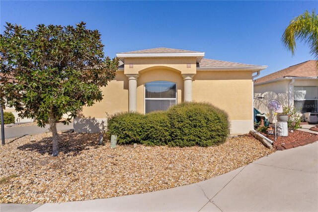 1135 Santa Cruz Dr, The Villages, FL 32162 - view of side of property with stucco siding