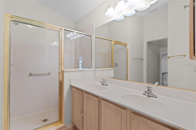 1135 Santa Cruz Dr, The Villages, FL 32162 - bathroom with a sink, lofted ceiling, a textured ceiling, and a shower stall