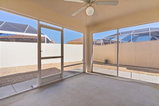 1135 Santa Cruz Dr, The Villages, FL 32162 - unfurnished sunroom with a ceiling fan