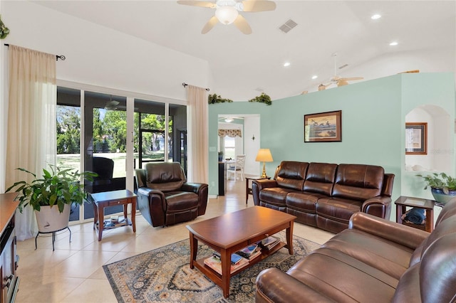 living area with visible vents, recessed lighting, light tile patterned flooring, ceiling fan, and vaulted ceiling