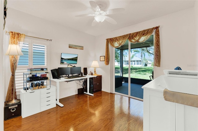 office area featuring a ceiling fan and wood finished floors