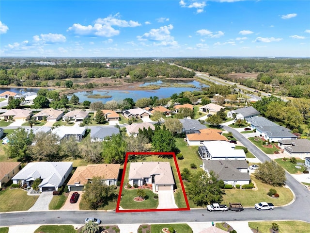 bird's eye view with a forest view, a residential view, and a water view