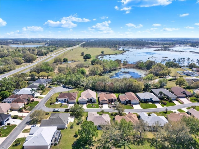 aerial view featuring a water view and a residential view