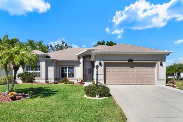 ranch-style home featuring stucco siding, driveway, a front lawn, and a garage