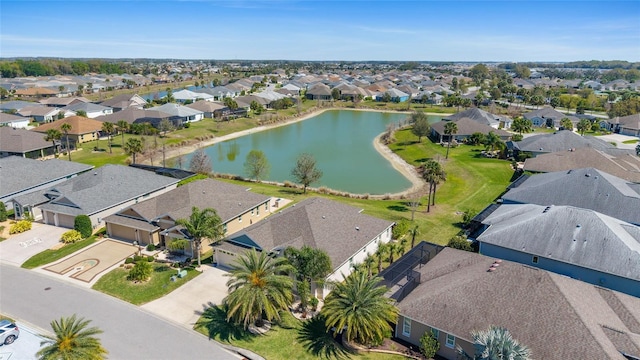 bird's eye view featuring a residential view and a water view