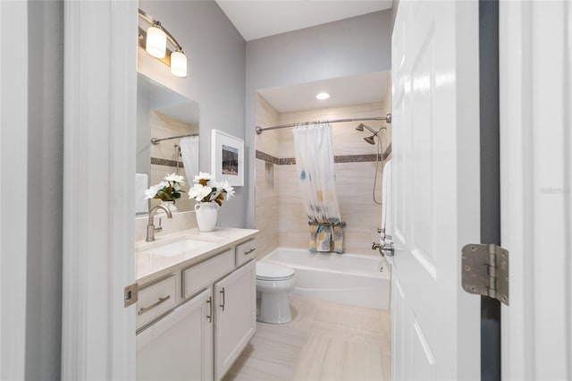 full bathroom with vanity, tile patterned floors, toilet, and shower / tub combo with curtain