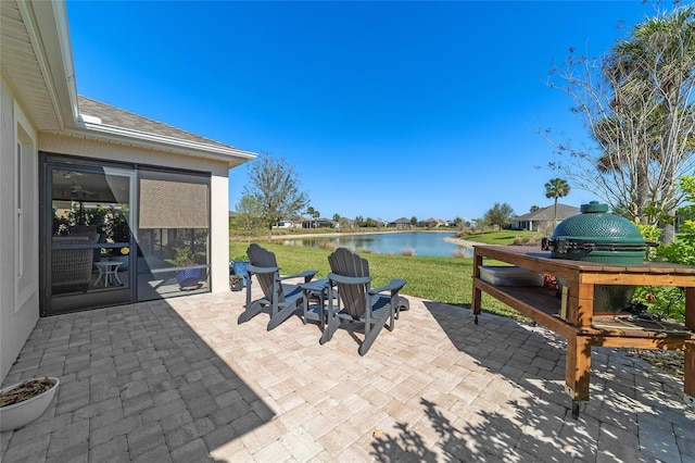 view of patio / terrace with a water view