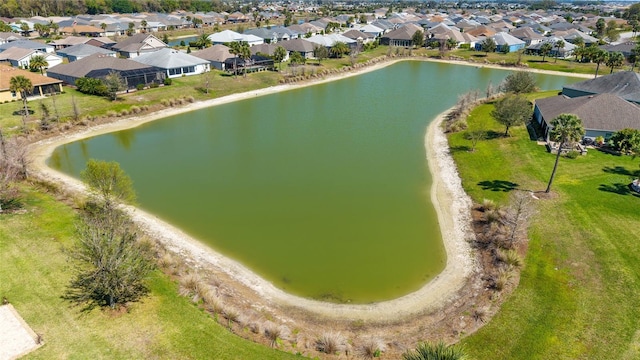 bird's eye view with a residential view and a water view