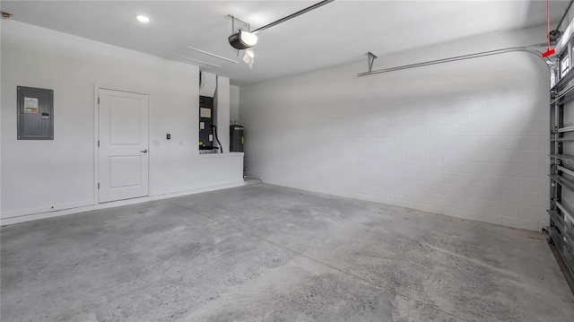 garage featuring heating unit, concrete block wall, electric panel, electric water heater, and a garage door opener