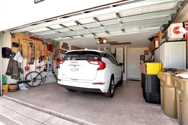 garage featuring a garage door opener