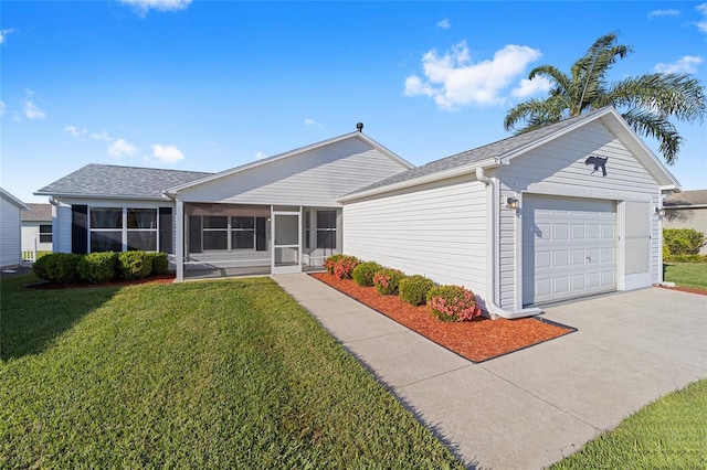 ranch-style house featuring a front lawn, roof with shingles, driveway, a sunroom, and an attached garage