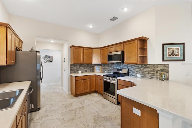 kitchen featuring visible vents, light countertops, appliances with stainless steel finishes, brown cabinetry, and open shelves