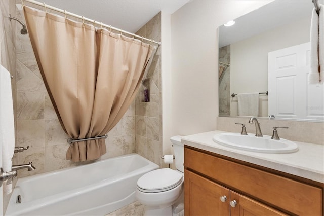 full bathroom with vanity, toilet, and shower / tub combo with curtain