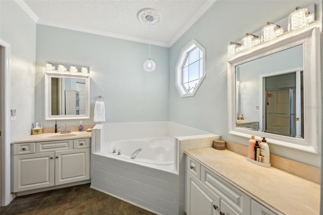 full bath with a textured ceiling, crown molding, tile patterned flooring, a bath, and vanity