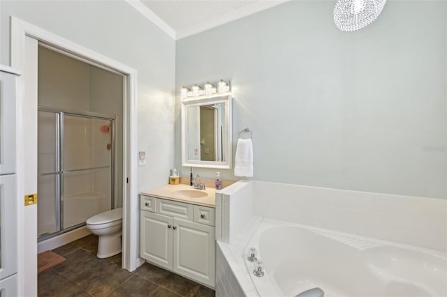 bathroom featuring vanity, a stall shower, ornamental molding, a garden tub, and toilet