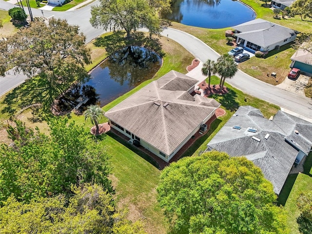 bird's eye view with a water view