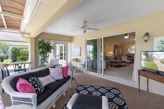 view of patio / terrace with an outdoor living space and a ceiling fan