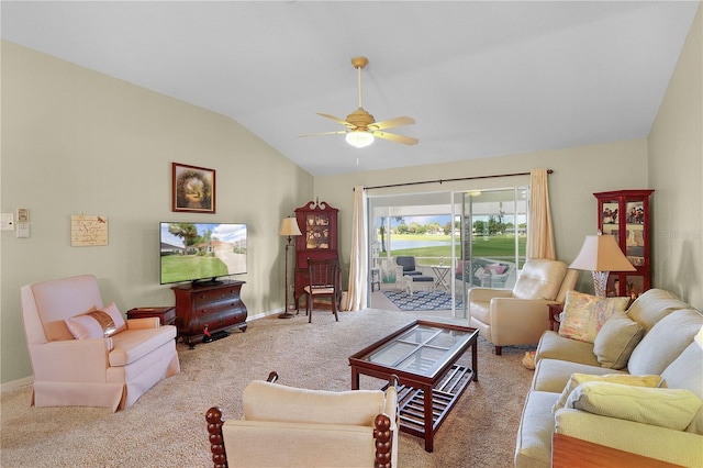 carpeted living room with ceiling fan, baseboards, and lofted ceiling