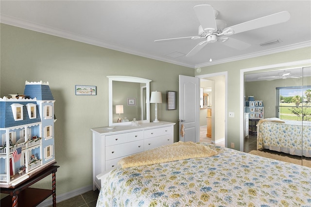 bedroom featuring tile patterned floors, baseboards, ceiling fan, and crown molding