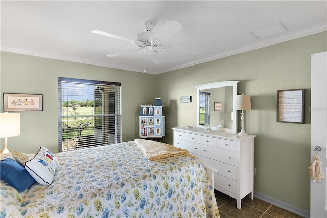 bedroom featuring dark tile patterned flooring, ceiling fan, and ornamental molding