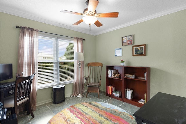 office with crown molding, a ceiling fan, baseboards, and tile patterned floors