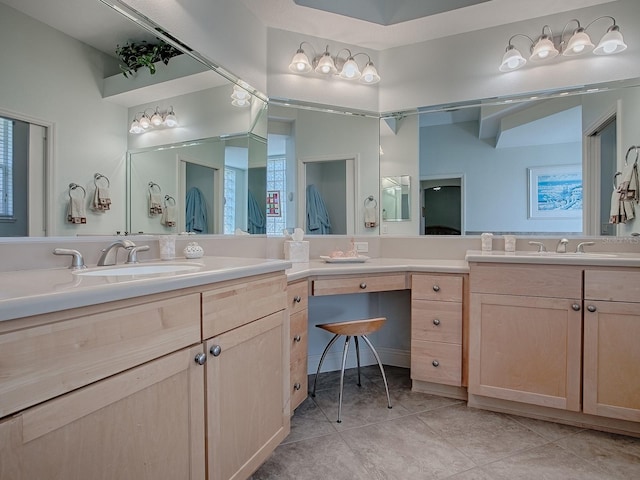 full bath with tile patterned floors and vanity