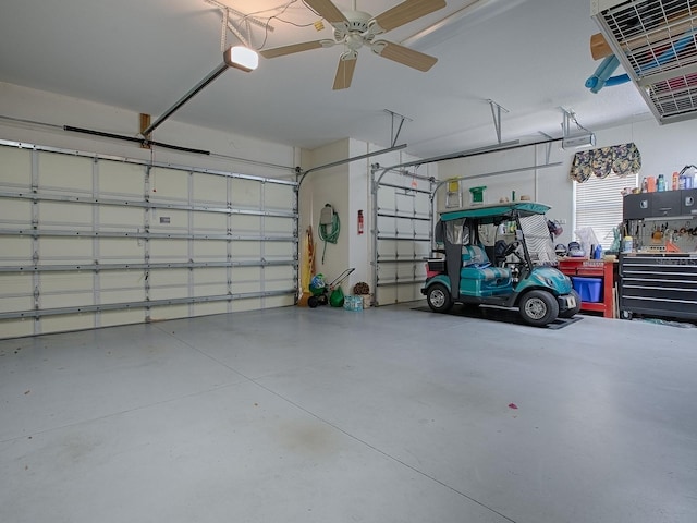 garage featuring a heating unit, a garage door opener, and a ceiling fan