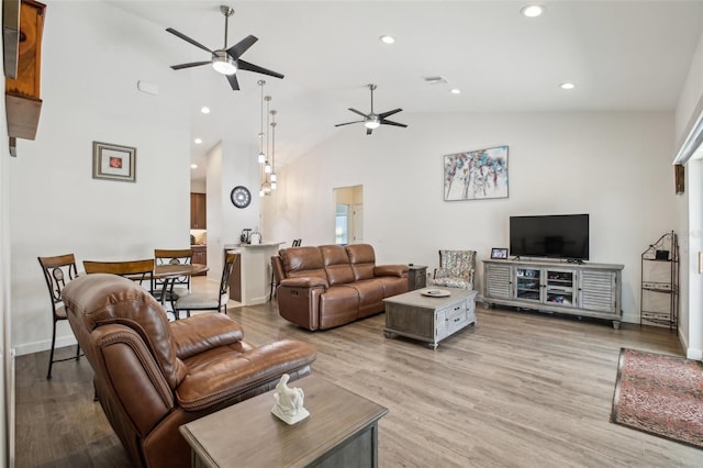 living area with light wood-style flooring, recessed lighting, visible vents, and ceiling fan