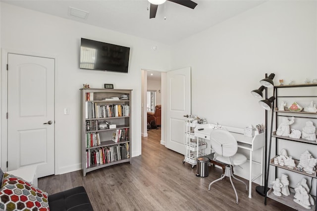 office with visible vents, baseboards, a ceiling fan, and wood finished floors