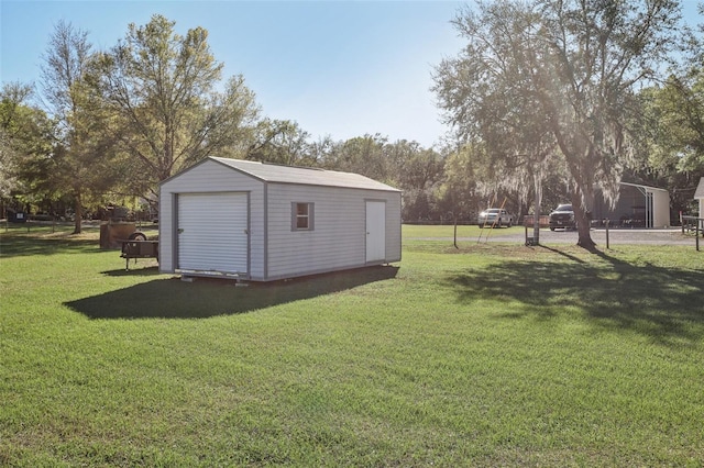 view of yard featuring an outbuilding and a shed