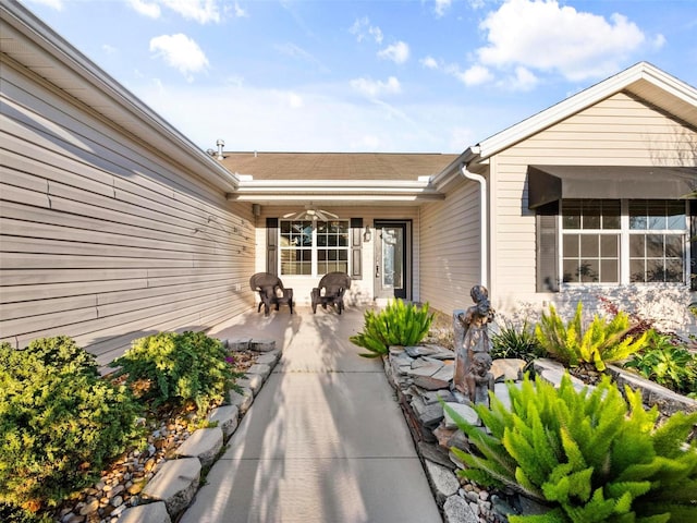 property entrance featuring a patio