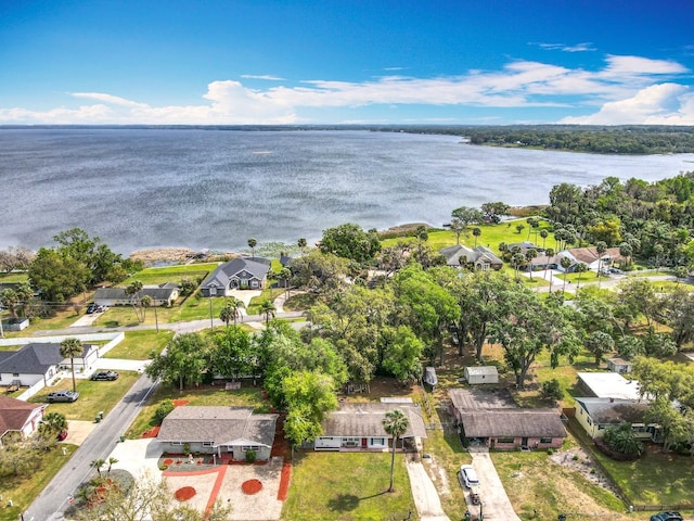 bird's eye view with a water view and a residential view