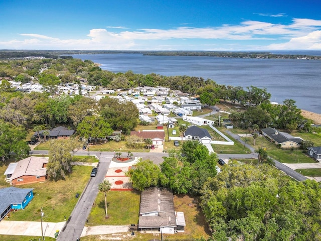 bird's eye view featuring a residential view and a water view